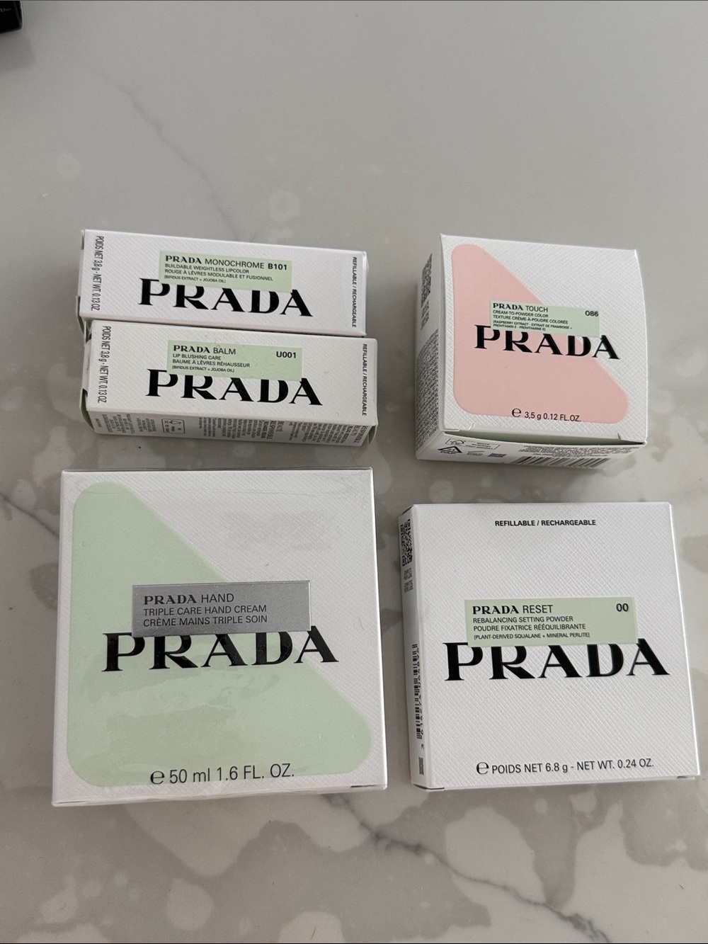 Prada Makeup: Lipstick, lip balm, blush, setting powder & hand cream - Set